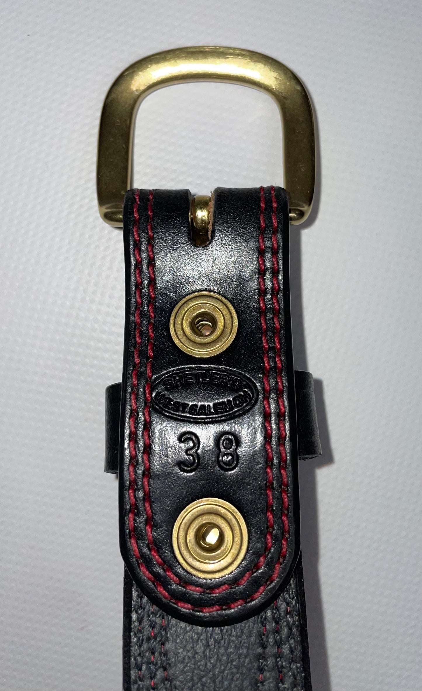 glossy red stitched leather belt